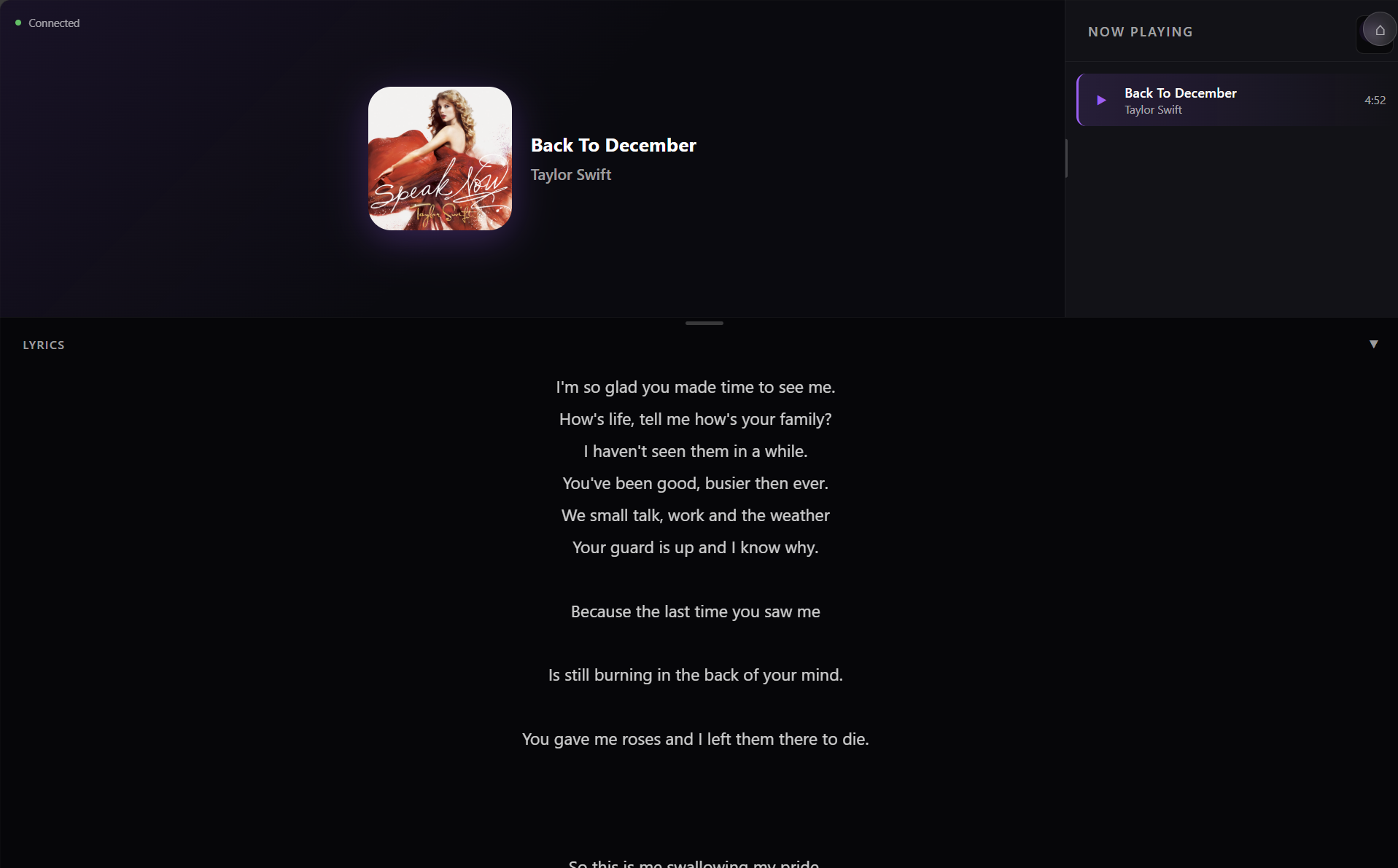 The Now Playing page — artwork, title, artist and album, rating, transport and the upcoming queue