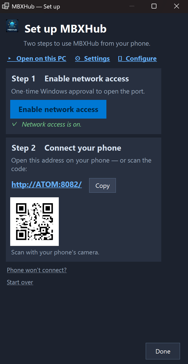 The Set up MBXHub first-run window - Step 1 Enable network access with a one-time Windows approval and a green 'Network access is on' confirmation, Step 2 Connect your phone showing the hub address with a Copy button and a QR code to scan
