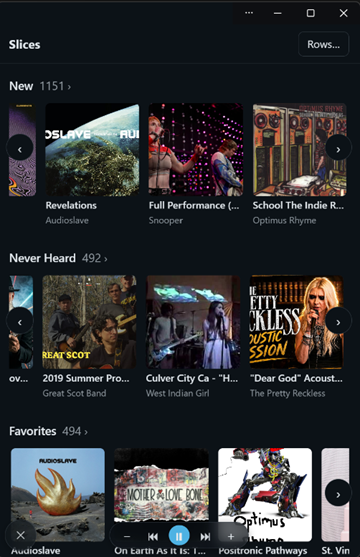 The Slices page in its charm frame — the library as sideways rows of album covers